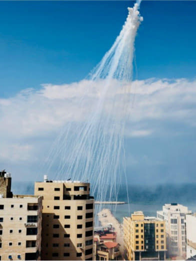 Throwing white phosphorus bombs on the Gaza port area