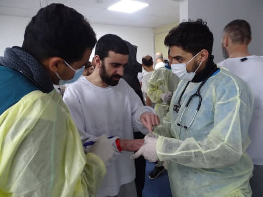 Ministry of Health in Gaza: Part of receiving liberated prisoners and providing examinations and treatment services to t