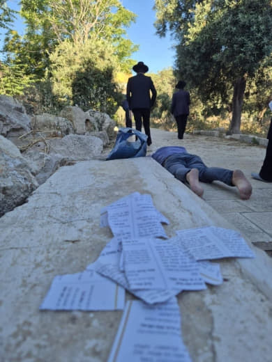 Israeli Jewish settlers perform rituals during a provocative incursion into the courtyards of the Al-Aqsa Mosque compoun