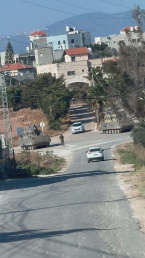 Footage shows Israeli armored vehicles detaining civilian vehicles and obstructing their movement at the entrance of Zub