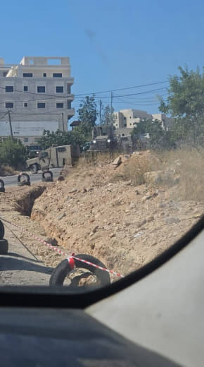 Israeli occupation forces block the road between the towns of Al-Mazra’a ash-Sharqiya and Silwad, east of Ramallah.