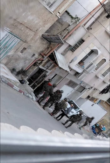 The army takes a number of young men from the Kafr Saba neighborhood in the city #Qalqilya To a house turned into a mili