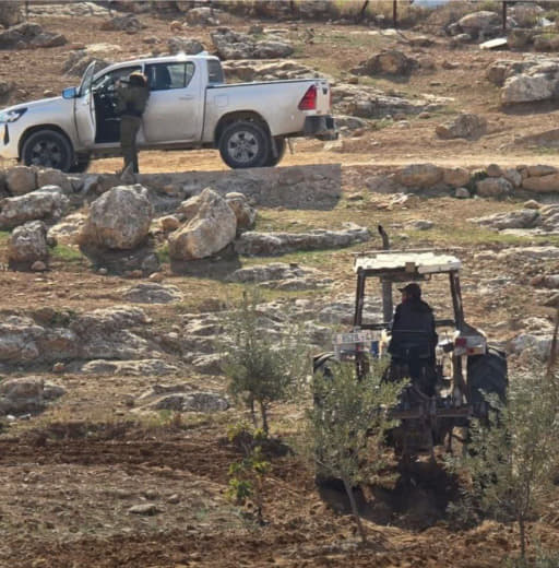 The occupation forces prevent a citizen from plowing his land in Khirbet Umm Al-Khair in Musafer Yatta, south of Hebron