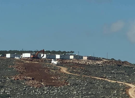 Settlers place additional caravans and bulldoze in the Karkafa area (the new settlement outpost) on Mount Qarqafa, betwe