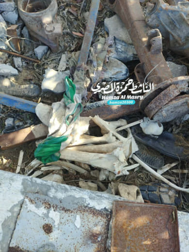 The remains of a martyr were found... in front of Al-Yazji bakery in the Al-Zaytoun area Anyone who recognizes him shoul