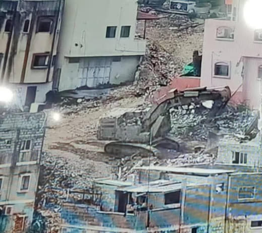 Israeli army bulldozers begin demolishing 25 buildings containing about 100 homes in Nour Shams camp, east of Tulkarm.