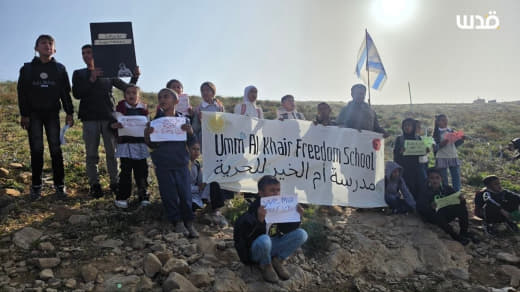 After Israeli settlers closed the road leading to their school, students of the Umm Al-Khair School staged a sit-in on t