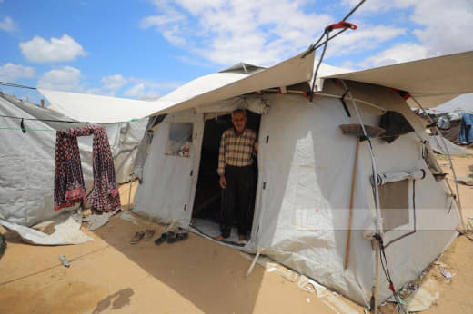 Displaced people are living in worn-out tents amid rubble and destruction in Deir al-Balah, amid a severe humanitarian c