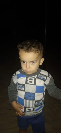 Peace be upon you There is a boy lost in the morning It is located opposite the old fishermen port of Khan Yunis He is a