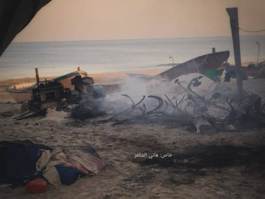 Occupation boats destroy Palestinian fishermen's boats on the shore of the Khan Yunis Sea, south of the Gaza Strip.