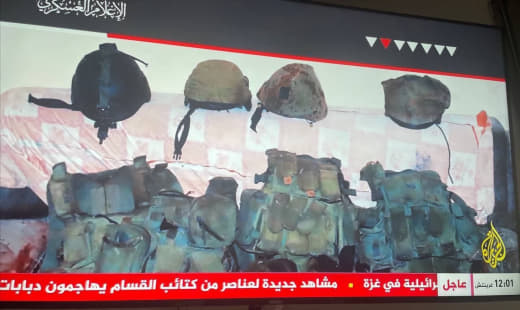 Scenes showing the military clothing of a number of Israeli soldiers, their necklaces, and military equipment