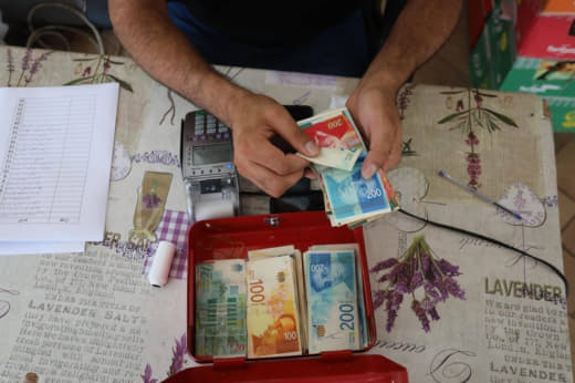 In response to a severe economic crisis, Palestinians across the occupied West Bank are forgiving debts en masse through