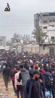 Mourners gather in Gaza City for the funeral of four people killed in an Israeli airstrike on Al-Shati refugee camp, wit