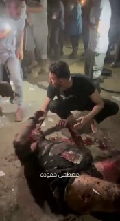 An Israeli air strike hits a group of civilians in Deir Al Balah, central Gaza. An Israeli air strike targets a group of