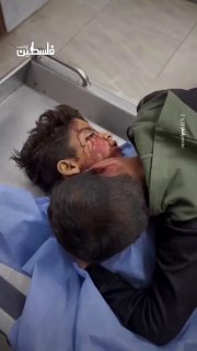 A heartbreaking farewell: The siblings of child martyr Adel Rafi al-Najjar mourn his loss after he was killed by the occ