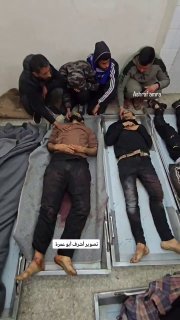 The bodies of the martyrs of the Al-Maghazi camp massacre, who were killed when the occupation targeted them as resistan