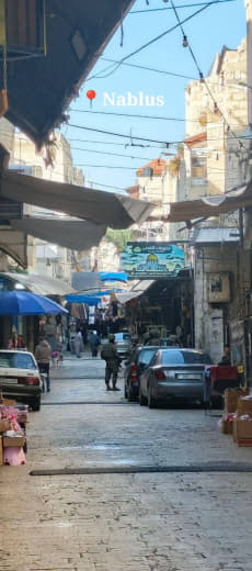 This picture is from downtown Nablus in the West Bank... Israeli soldiers are freely patrolling the streets. Foto ini di