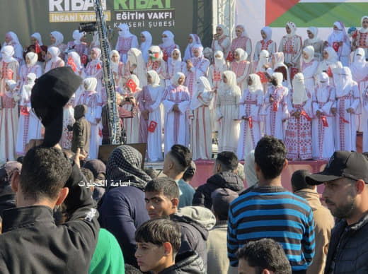 Under the slogan “Despite destruction and siege, we love life,” a large mass wedding festival was held with official and