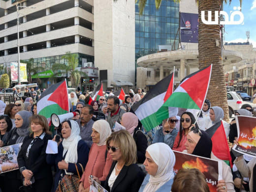 Palestinians hold a vigil in downtown Nablus in protest of the Israeli aggression on Gaza.