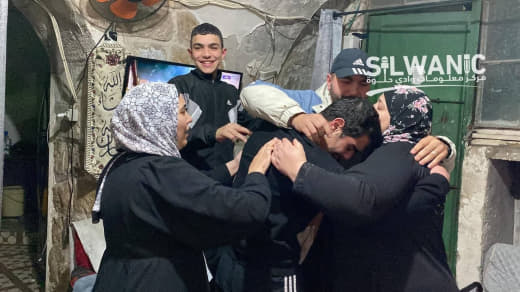 Young prisoner Ahmed Al-Ajlouni reunites with his family after being liberated from the Israel prisons as part of the ex