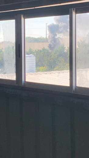 A Palestinian Young man set fire to an Israeli occupation forces observation point near the separation wall to the west 