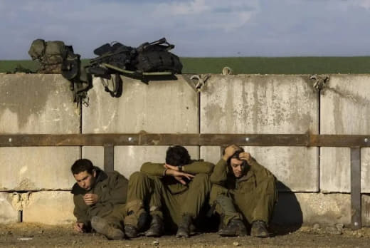 Israeli media sources report that an Israeli soldier, who had returned from Gaza, woke up from a nightmare while sleepin