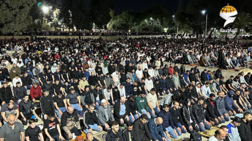 Despite Israeli occupation obstacles, tens of thousands of Palestinians perform the evening and Tarawih prayers at Al-Aq