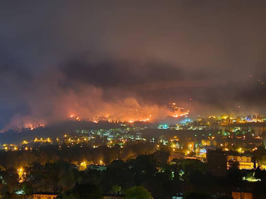 A massive fire spreads to the houses in Kiryat Shmona settlements in northern occupied Palestine following Hezbollah's r