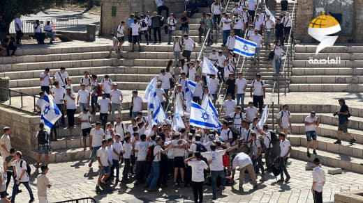 Hundreds of Israeli settlers gather at the Bab Al Amud plaza in occupied Jerusalem, preparing to break into the Muslim Q