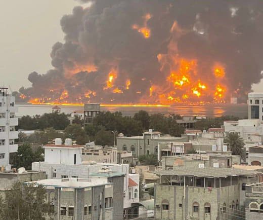 BREAKING: Massive fires erupt following a barrage of airstrikes targeting the city of Al Hudaydah in Yemen. The airstrik