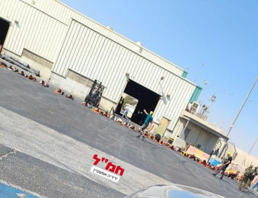 Israeli occupation forces subject Jordanian truck drivers to a humiliating search following the deadly shooting operatio