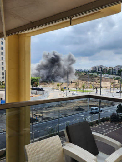Columns of smoke seen right now in Tel Aviv following a barrage of rockets from Gaza.