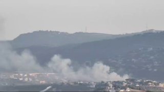 Israeli occupation targets residential areas in the town of Kfar Kila in southern Lebanon with white phosphorus shells.