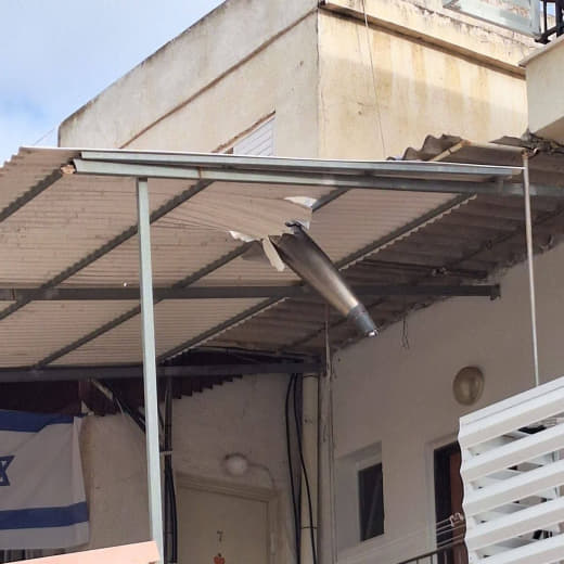 An Israeli interceptor missile fell on a settler's home after failing to stop incoming Iranian missiles.