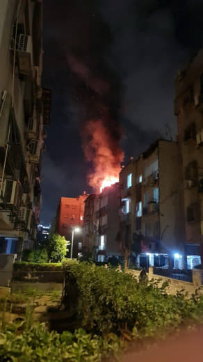 Breaking | A fire broke out after an Iranian missile struck a building in Holon, central occupied Palestine.