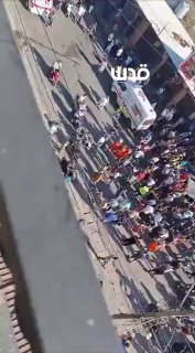 New scenes.. Ambulance teams rush to the site of occupation forces' bombing of a vehicle in northern Lebanon