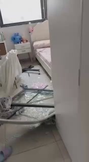 Damage reported in settlers’ houses near the site where the Iranian missile landed in the occupied city of Beersheba.