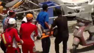Rescue teams are evacuating the wounded and clearing rubble after an Israeli airstrike targeted Evin Prison in Tehran, I