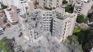 ⚡️ Aerial footage of the buildings targeted by the Iranian missile that destroyed large portions of them in Beersheba, s