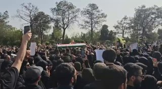 Iranians take part in the funeral procession in Tehran for Brigadier-General Ali Hajizadeh, the former commander of the 